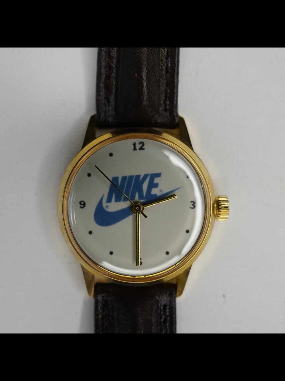 Vintage 1990s Nike Swoosh Logo Men's Quartz Watch Gold Tone White Dial